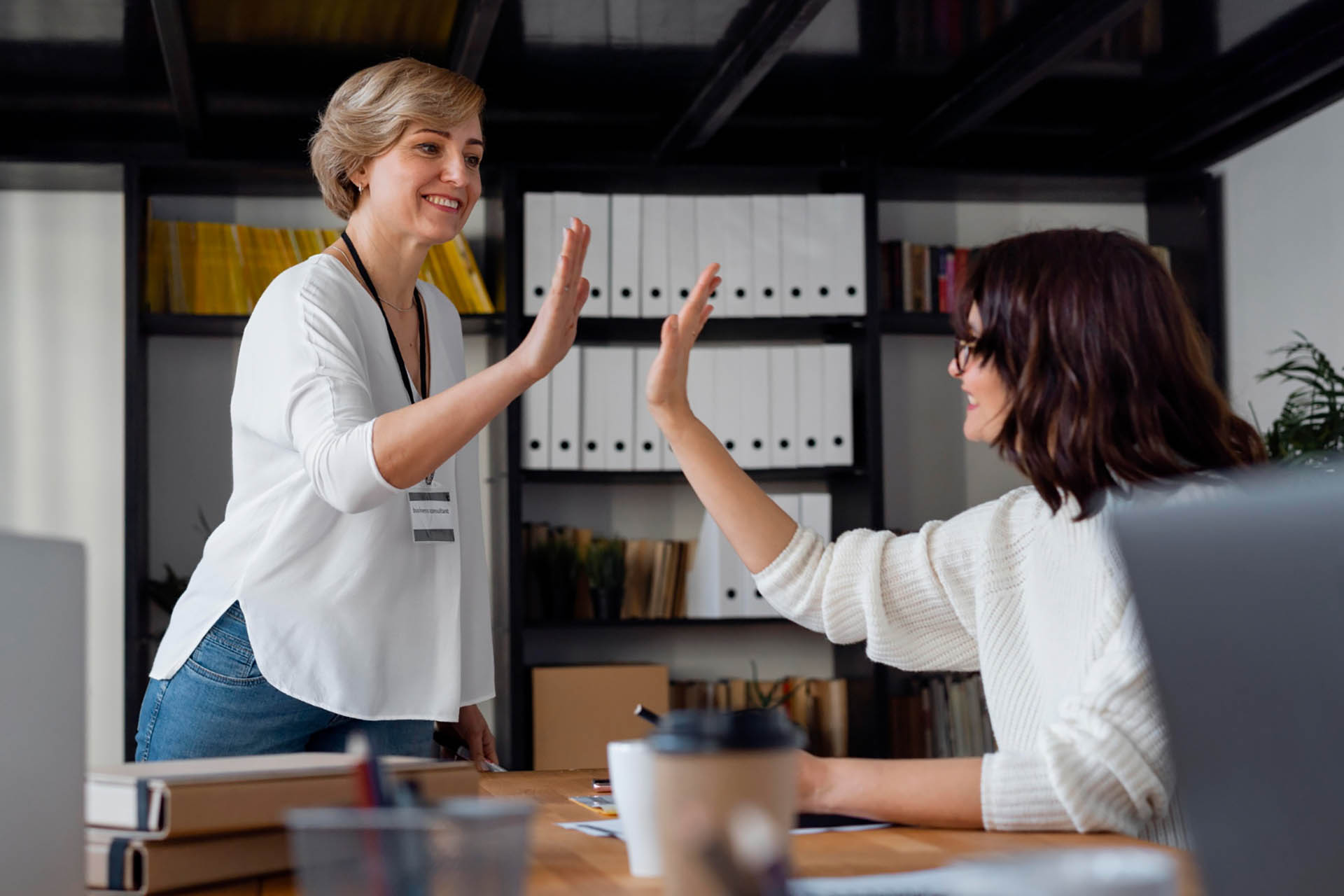 Business women celebrating success